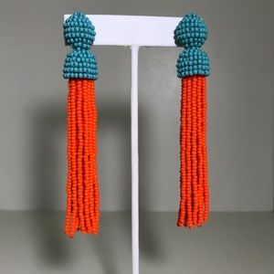Hand beaded 3” drop tassel earrings.